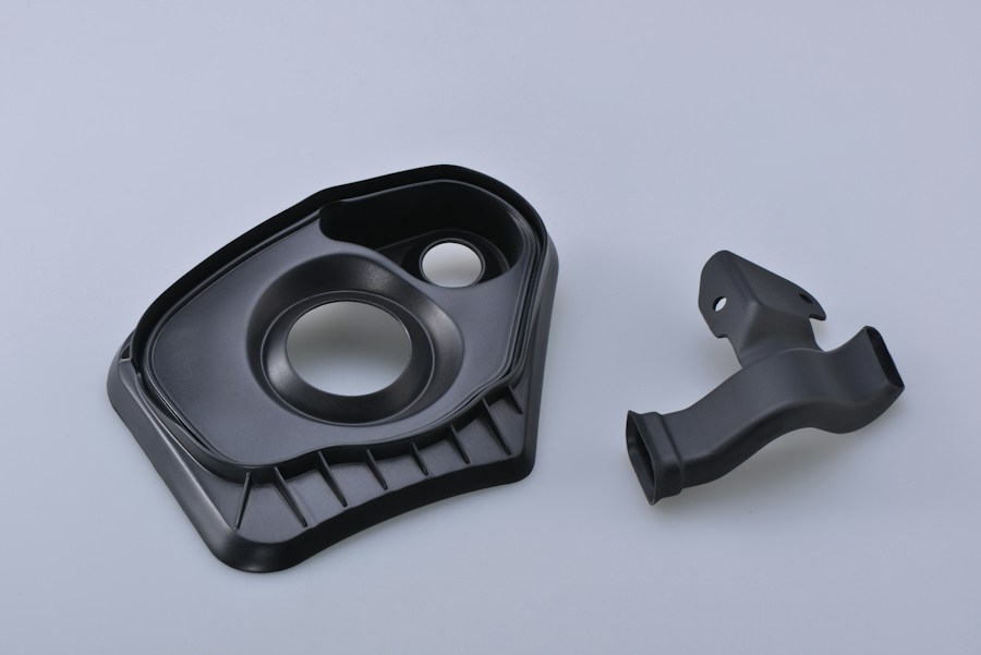 Dark coated mechanical component