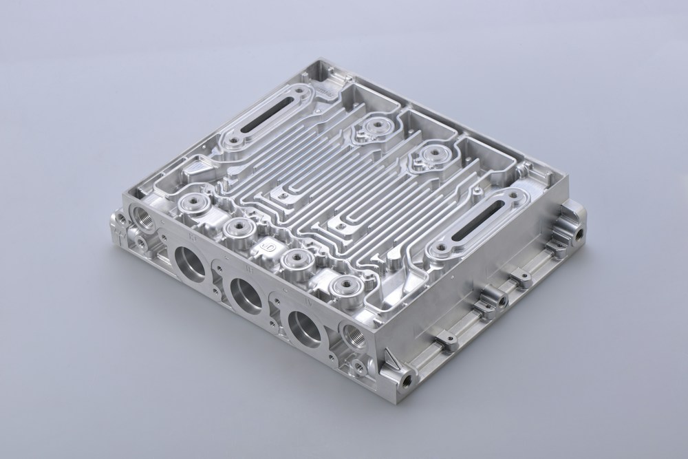 Complex precision machined aluminum housing with multiple pockets and compound geometry